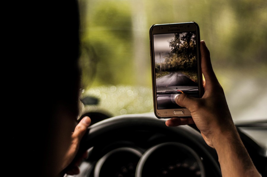 Driving whilst using a mobile phone 